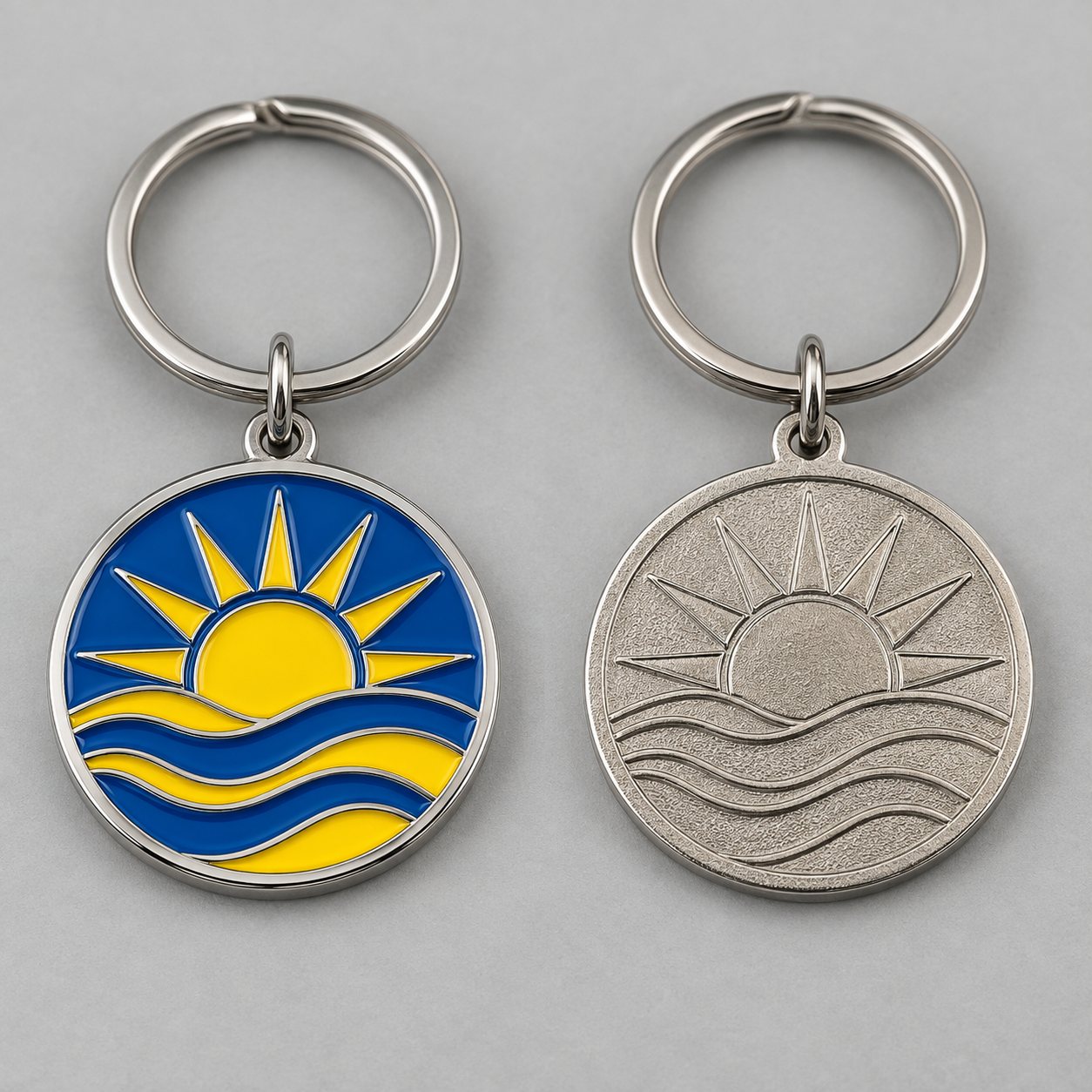 Two-sided silver club keychain with blue and yellow soft enamel on a split ring